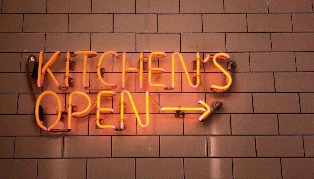 Kitchen's Open neon sign